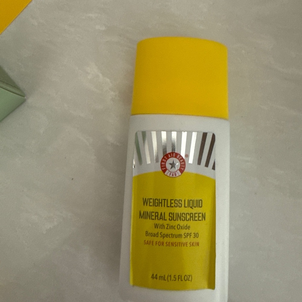 First Aid Beauty Yellow and White Suncare Collection